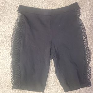 Ladies Small Fashion Nova shorts- fishnet sides.